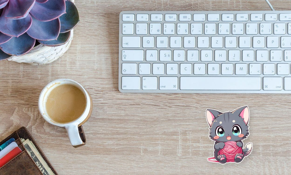 Cute Kitten with a Ball of Threads Sticker