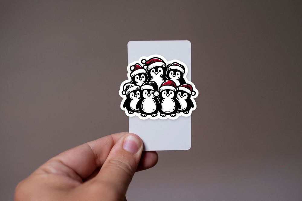 Cute Penguins in Christmas Hats Sticker