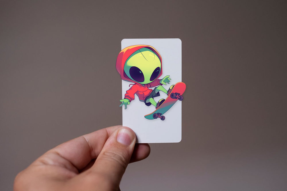 Skateboarding Alien in Red Hoodie Sticker